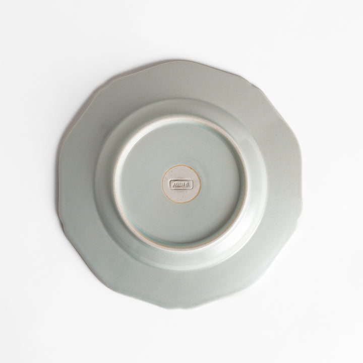 Pretty gray dessert plate with a delicate scalloped edge, ideal for showcasing your favorite treats.