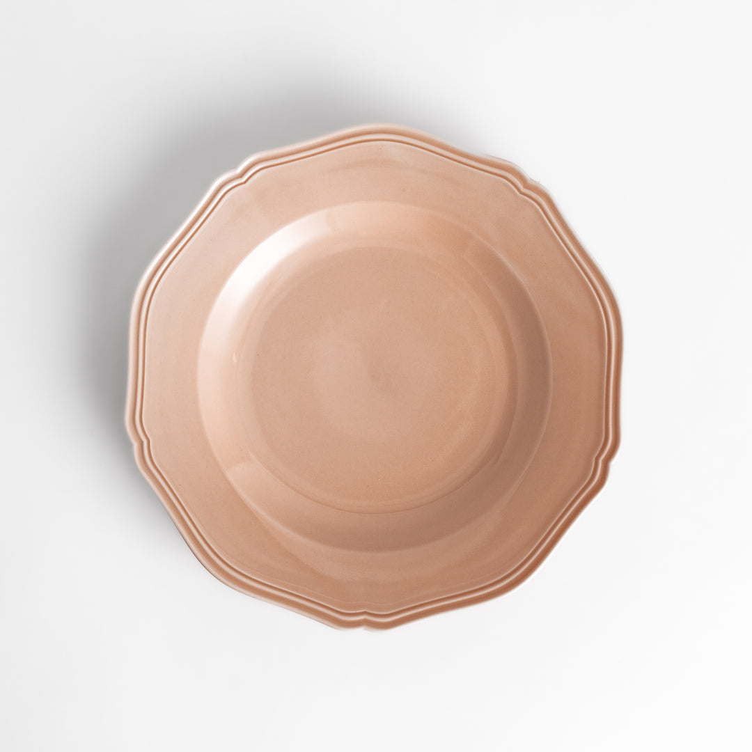 Pretty pink dinner plate with a delicate scalloped edge, ideal for showcasing your culinary creations.