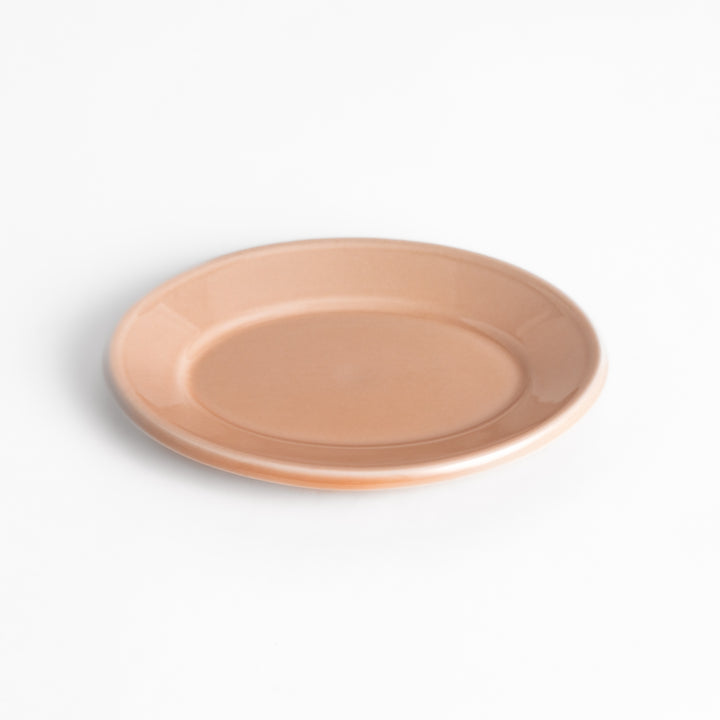 Durable and elegant pink ceramic dessert plate, adding a pop of color to your table setting.