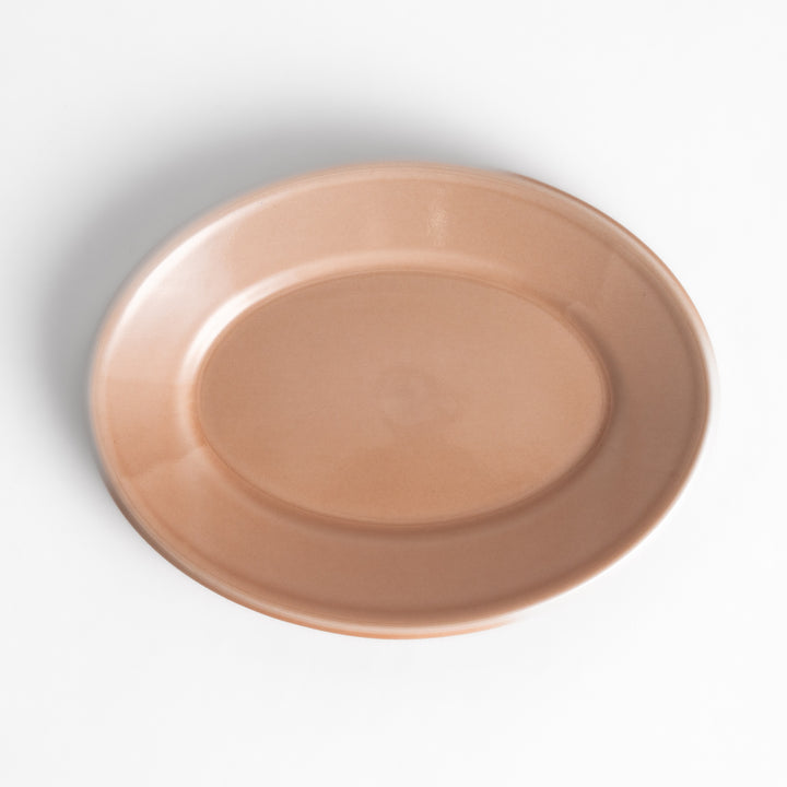 Durable and elegant pink ceramic dessert plate, adding a pop of color to your table setting.