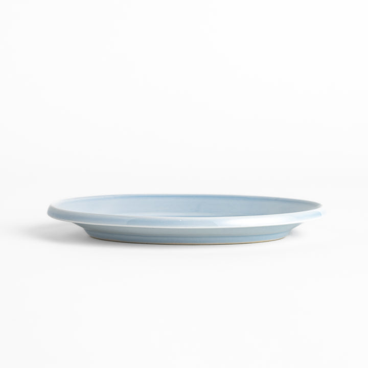 Durable and elegant blue ceramic dessert plate, adding a pop of color to your table setting.