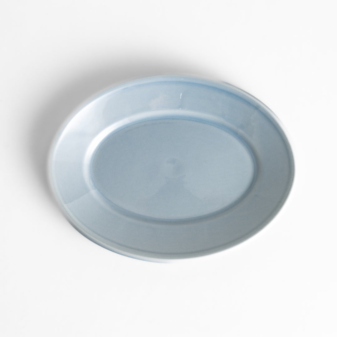 Durable and elegant blue ceramic dessert plate, adding a pop of color to your table setting.