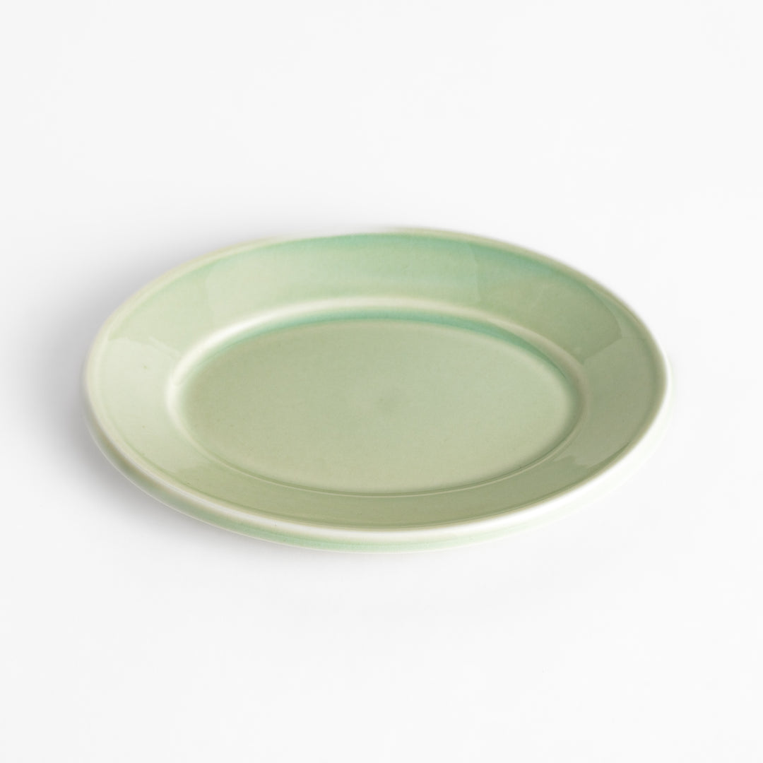 Durable and elegant green ceramic dessert plate, bringing a fresh touch to your table setting.