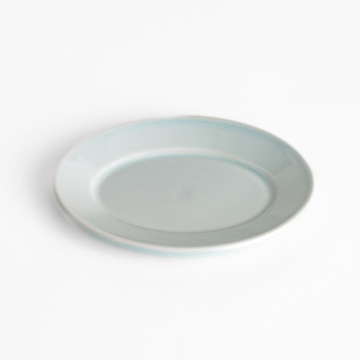 Durable and elegant white ceramic dessert plate, a classic and versatile addition to any table.