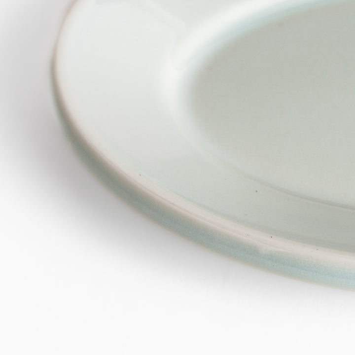 Durable and elegant white ceramic dessert plate, a classic and versatile addition to any table.