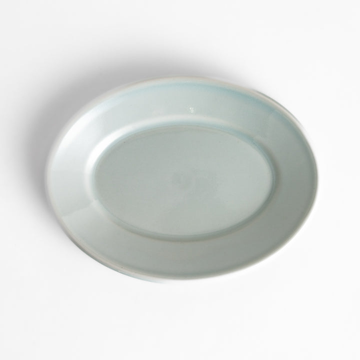 Durable and elegant white ceramic dessert plate, a classic and versatile addition to any table.