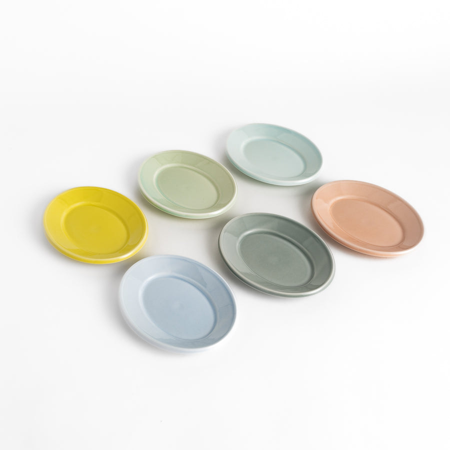 Durable and elegant dessert plates in soft pastel hues, crafted from high-quality ceramic for long-lasting enjoyment.