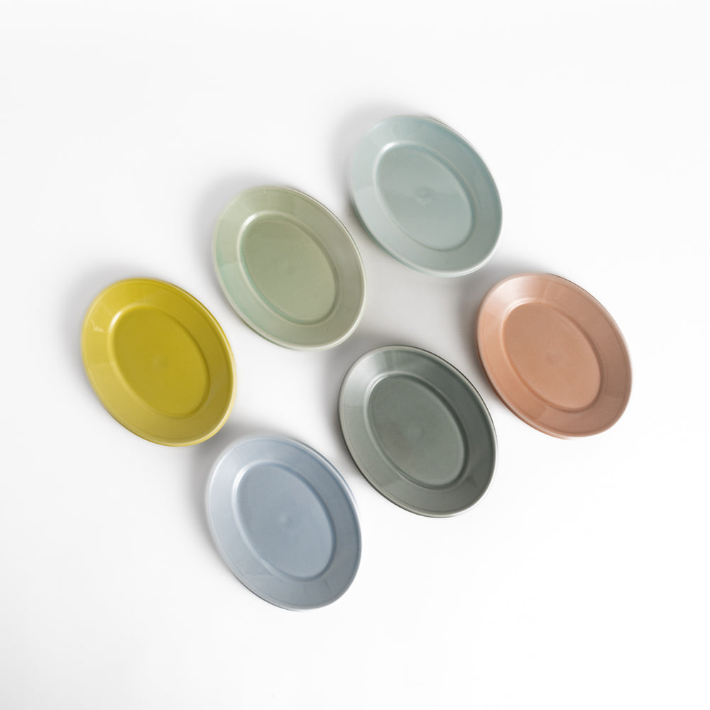 Durable and elegant dessert plates in soft pastel hues, crafted from high-quality ceramic for long-lasting enjoyment.