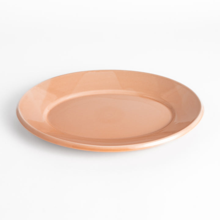 Durable and elegant pink ceramic dinner plate, adding a pop of color to your table setting.