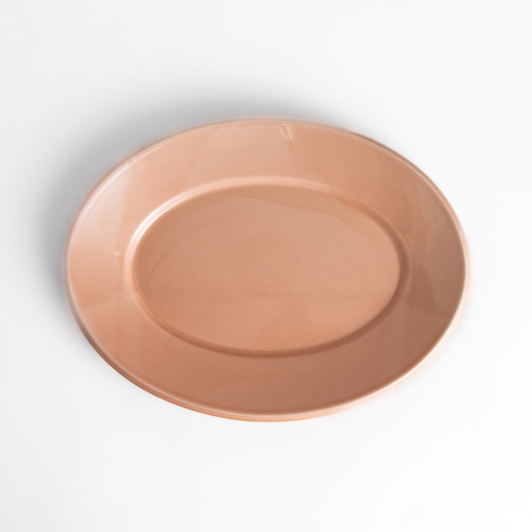 Durable and elegant pink ceramic dinner plate, adding a pop of color to your table setting.