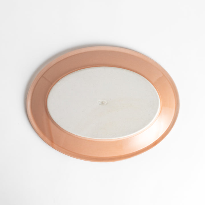 Durable and elegant pink ceramic dinner plate, adding a pop of color to your table setting.