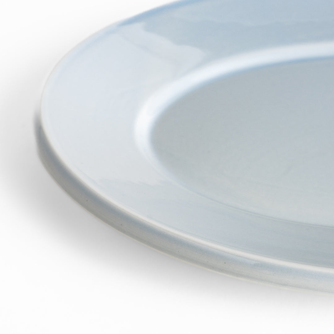 Durable and elegant blue ceramic dinner plate, adding a pop of color to your table setting.