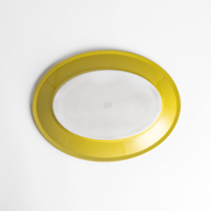 Durable and elegant yellow ceramic dinner plate, adding a pop of sunshine to your table setting.