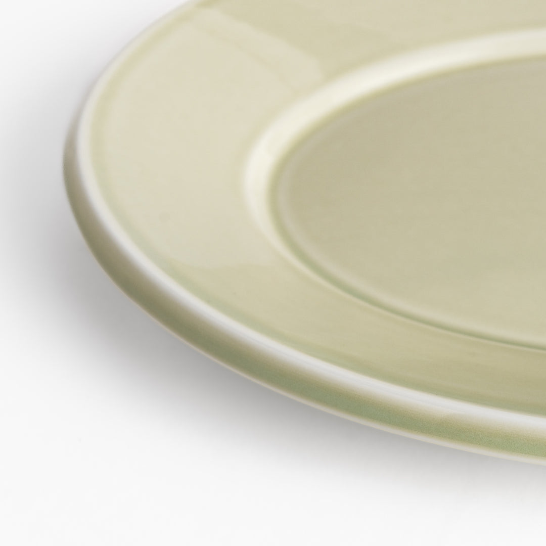 Durable and elegant green ceramic dinner plate, bringing a fresh touch to your table setting.