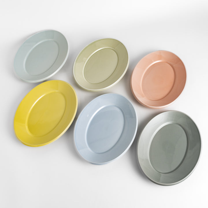 Beautiful pastel dinner plates in a variety of soft hues, ideal for any occasion.