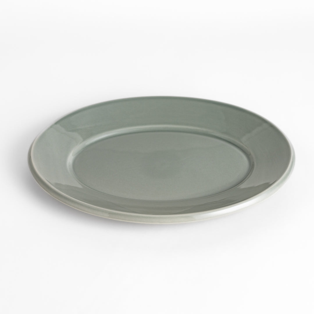 Durable and elegant gray ceramic dinner plate, offering a modern and sophisticated touch to your dining.