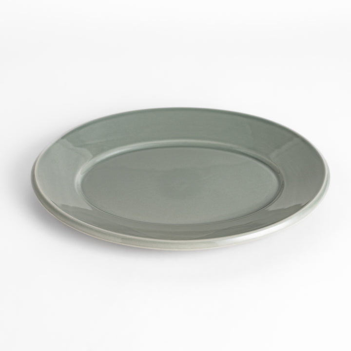 Durable and elegant gray ceramic dinner plate, offering a modern and sophisticated touch to your dining.