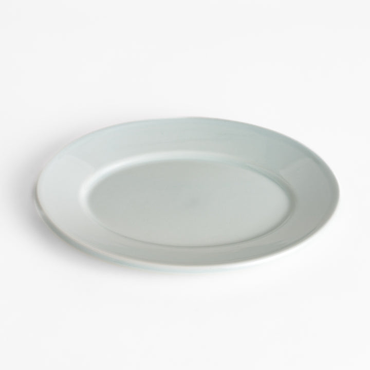 Durable and elegant white ceramic salade plate, a classic and versatile addition to any table.