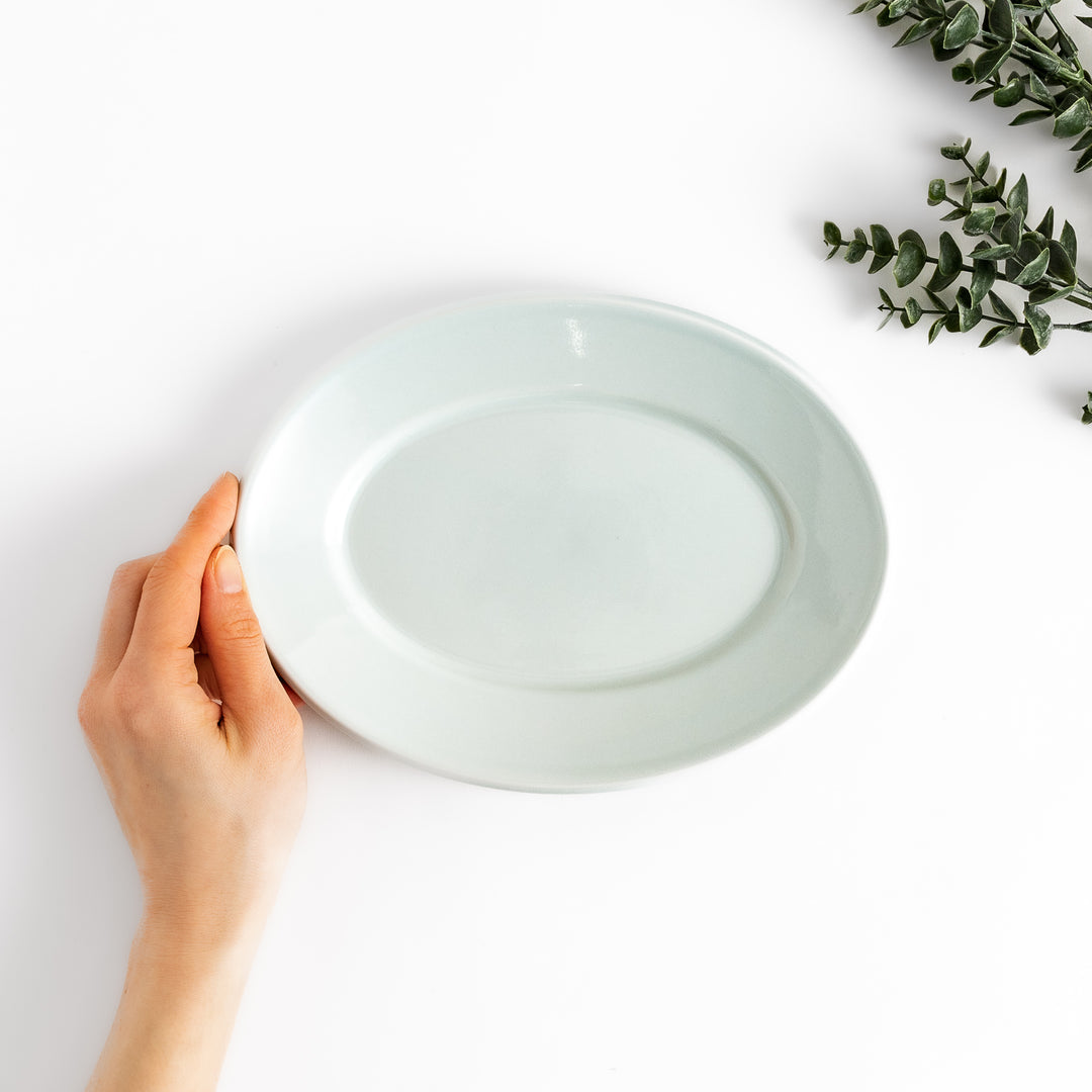 Durable and elegant white ceramic salade plate, a classic and versatile addition to any table.