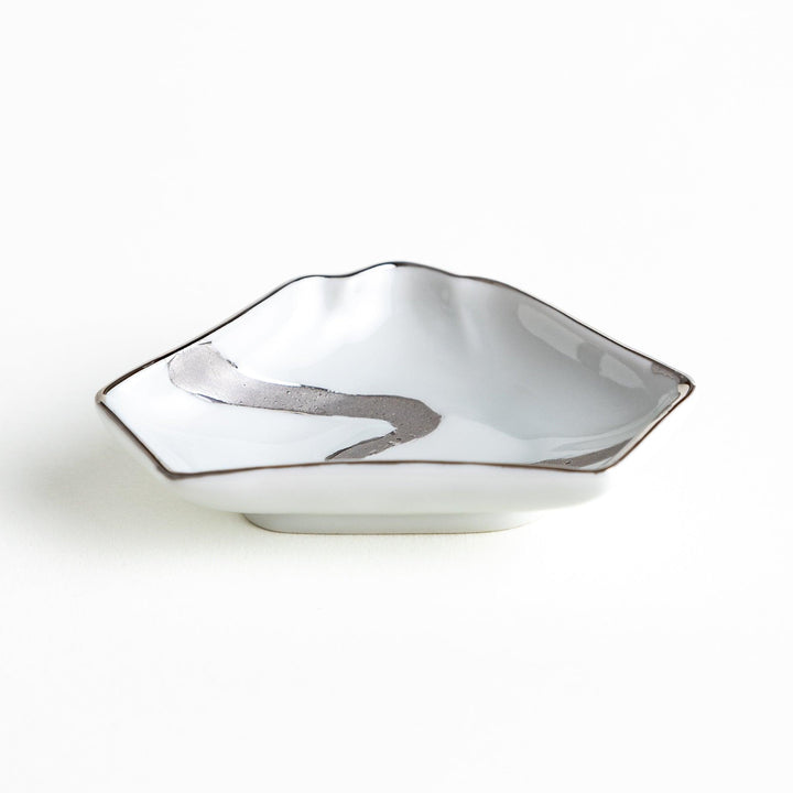 Mt. Fuji-shaped plate with a silver wave pattern on a white background.