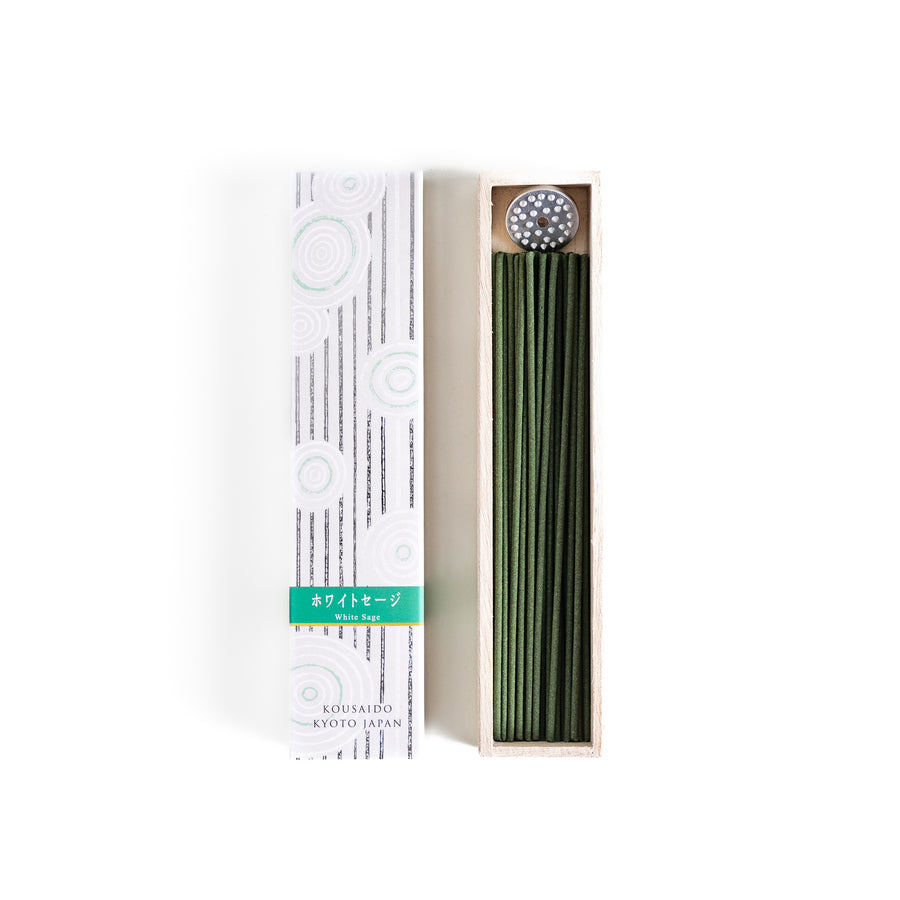 Purity White Sage Incense in a light wooden box with deep green sticks, elegantly packaged in a white design featuring subtle circular patterns, evoking a fresh and cleansing white sage aroma.