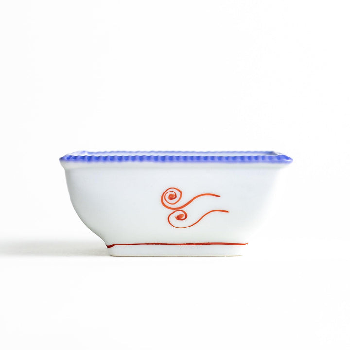 A square bowl featuring a rabbit and snowflake with a light blue rim.