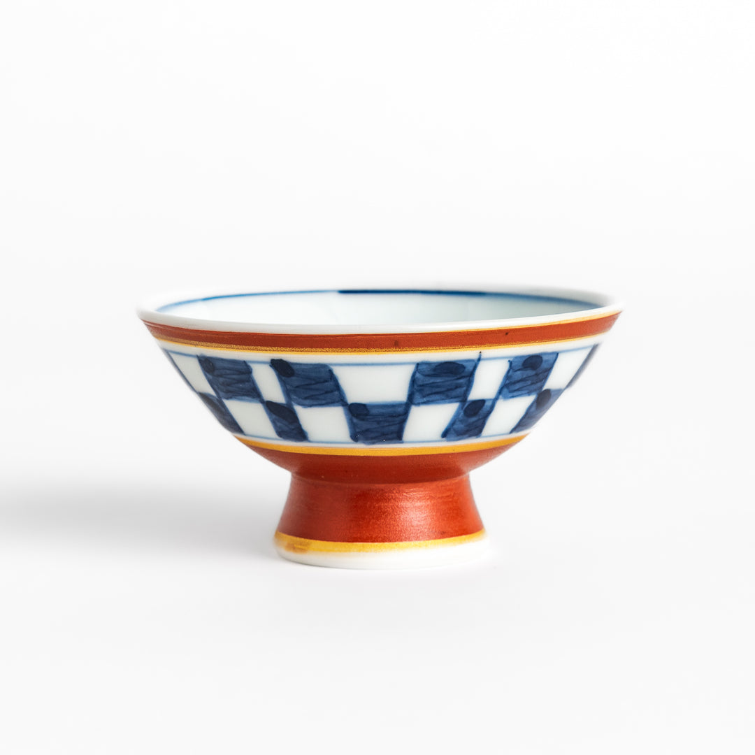 Elegant Japanese Sake Cup featuring a red and white design with gold accents, perfect for enjoying your favorite sake.