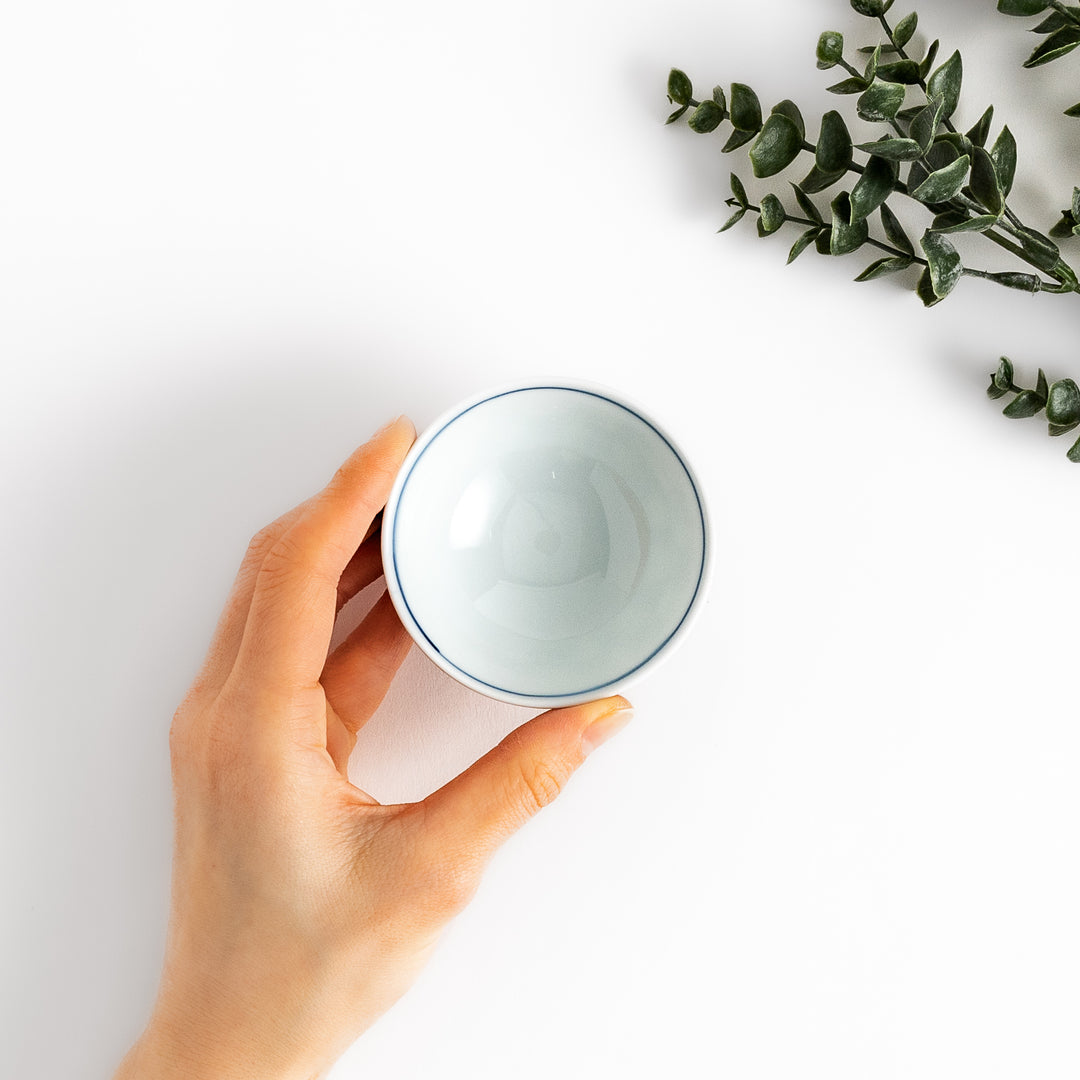 Elegant Japanese Sake Cup featuring a red and white design with gold accents, perfect for enjoying your favorite sake.