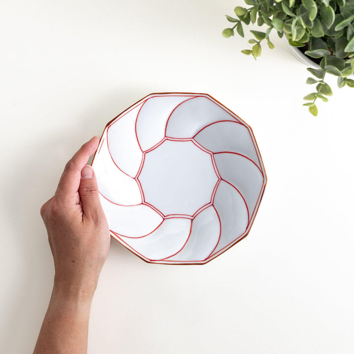 Medium-sized octagonal salad plate with a petal design and bowl shape, outlined in blue and red with a brown rim.