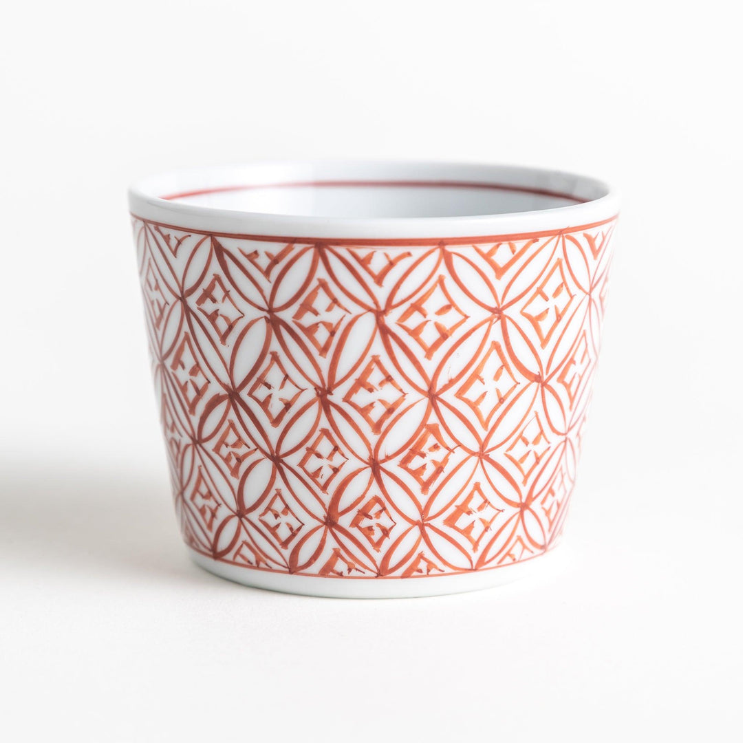 A small condiment bowl adorned with a blue or red geometric lattice pattern, providing a classic and intricate look.