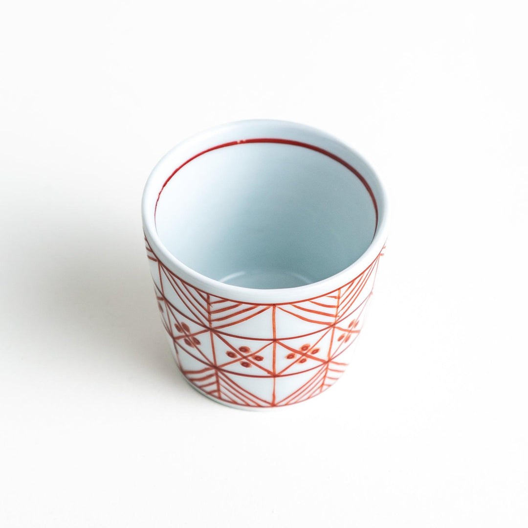 A condiment bowl featuring a geometric pattern of pine, bamboo, and plum, available in blue or red ink.