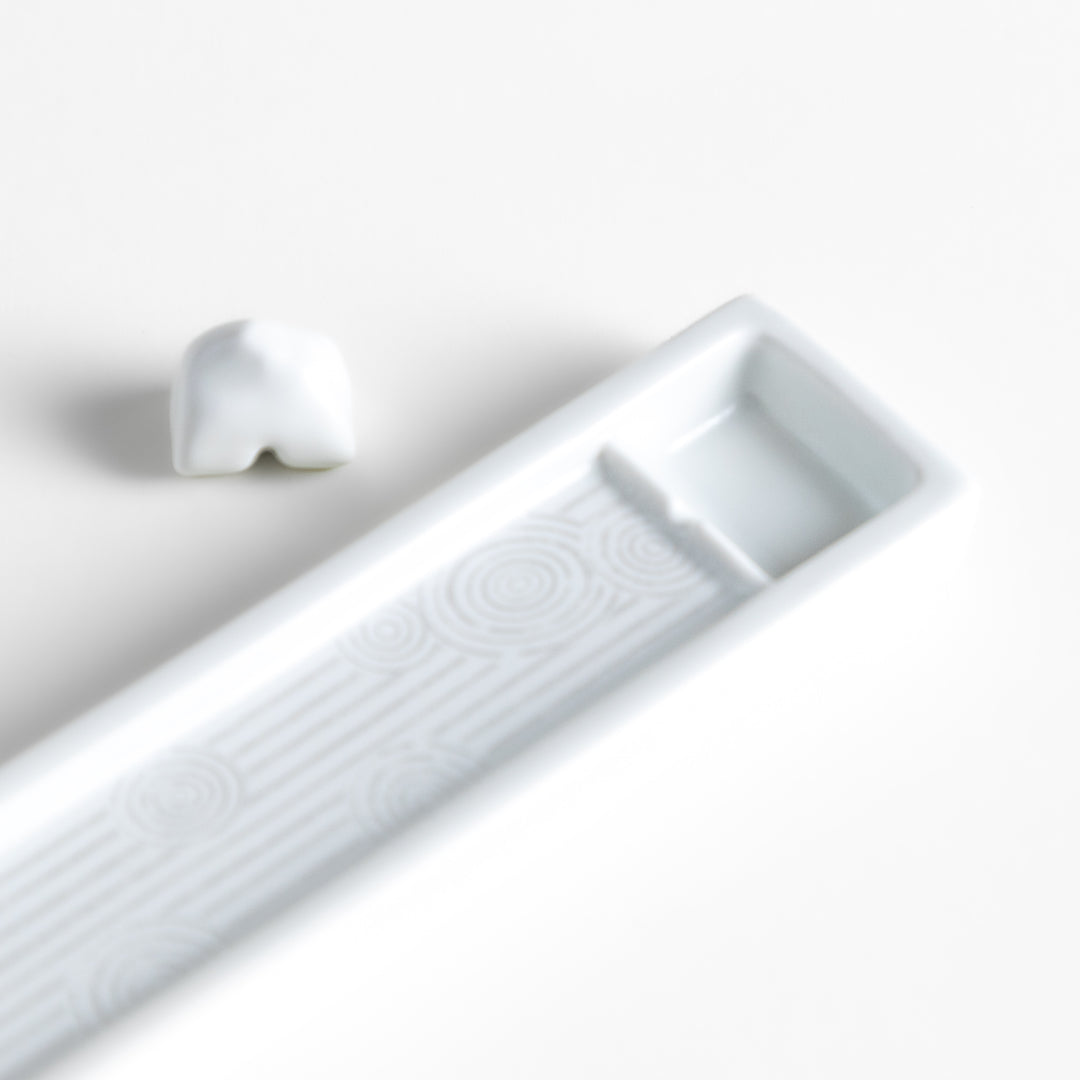 Zen-inspired white ceramic Incense Holder featuring a raked sand pattern.