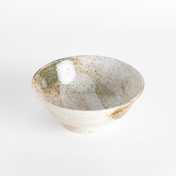 Side view of the rustic earth-tone ramen bowl displaying its curved shape and earthy colors.