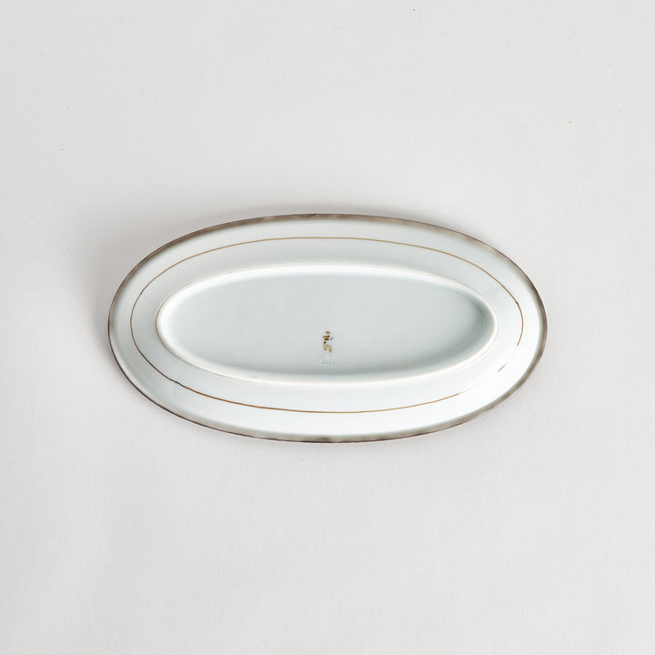 Back view of the oval salad plate, showcasing the plain white underside.