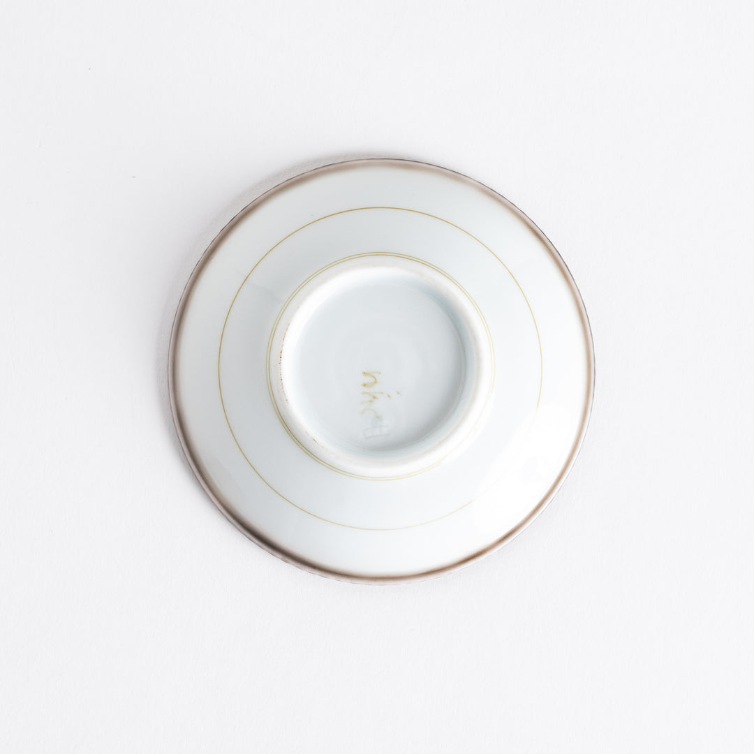 A round white sauce dish with a rustic scallop-edged border. The border comes in blue, brown, and olive.