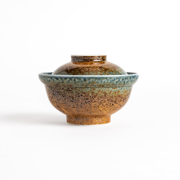 Ceramic donburi bowl with a reactive glaze in shades of brown and blue, complete with a lid, perfect for serving rice dishes, noodles, or soups in style.