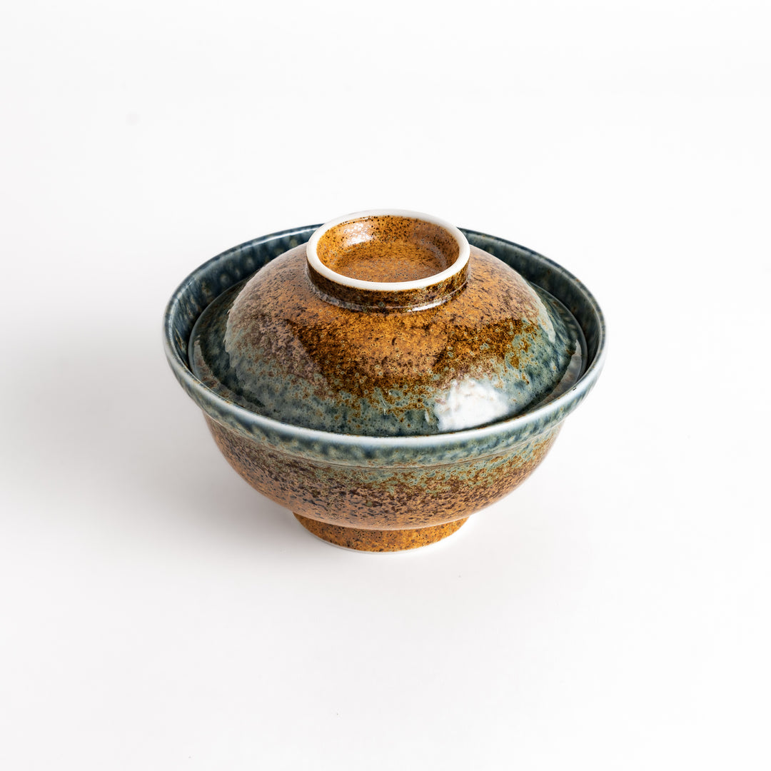 Ceramic donburi bowl with a reactive glaze in shades of brown and blue, complete with a lid, perfect for serving rice dishes, noodles, or soups in style.