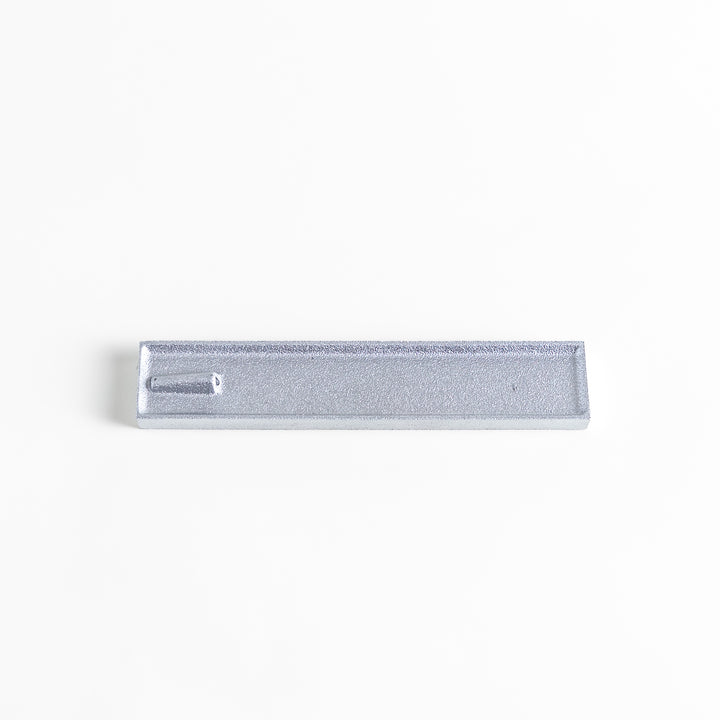 Sleek aluminum incense holder with a modern minimalist design, featuring a rectangular tray and a built-in slot to securely hold incense sticks while catching ash.