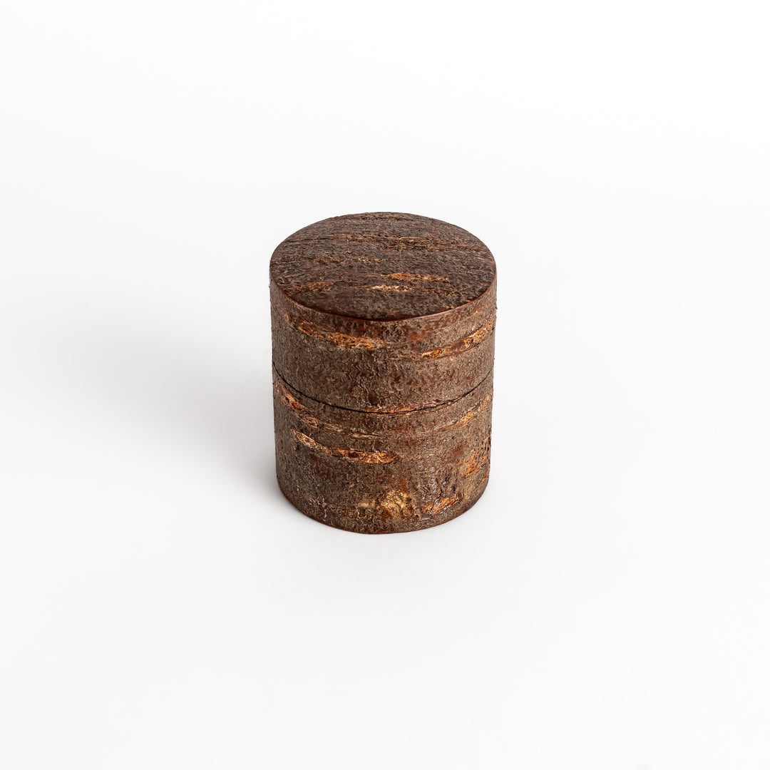 Rustic cherry bark tea caddy with a natural, textured finish, perfect for storing and preserving loose leaf tea.