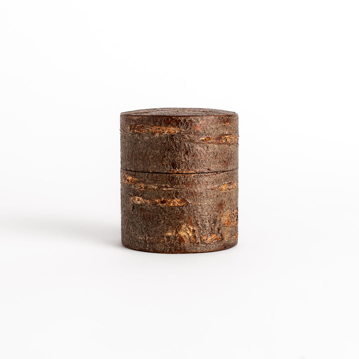 Rustic cherry bark tea caddy with a natural, textured finish, perfect for storing and preserving loose leaf tea.