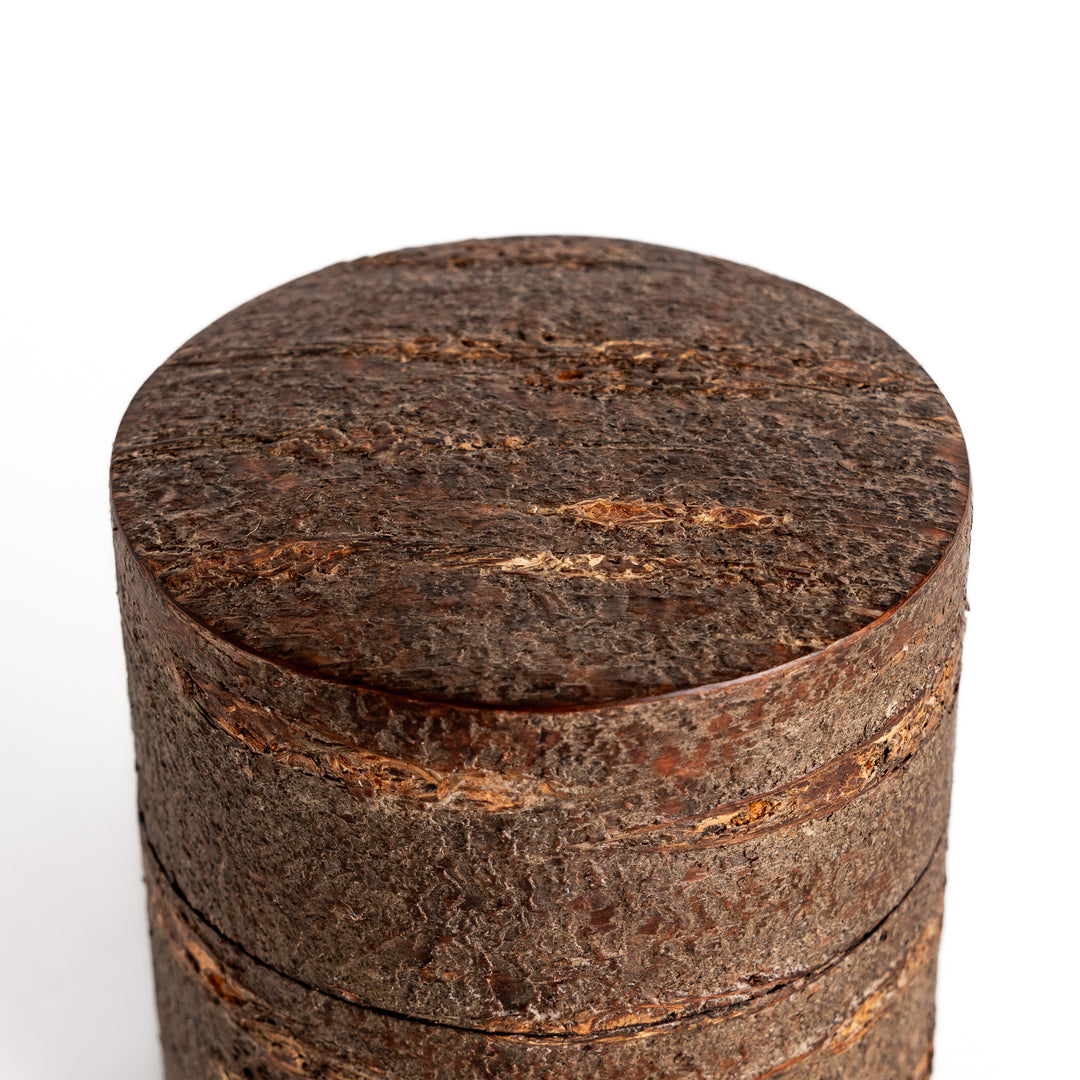 Rustic cherry bark tea caddy with a natural, textured finish, perfect for storing and preserving loose leaf tea.