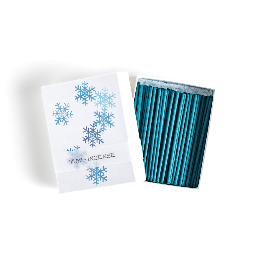 Incense featuring deep blue sticks in a box decorated with delicate snowflake patterns, evoking a crisp and refreshing winter fragrance perfect for relaxation.