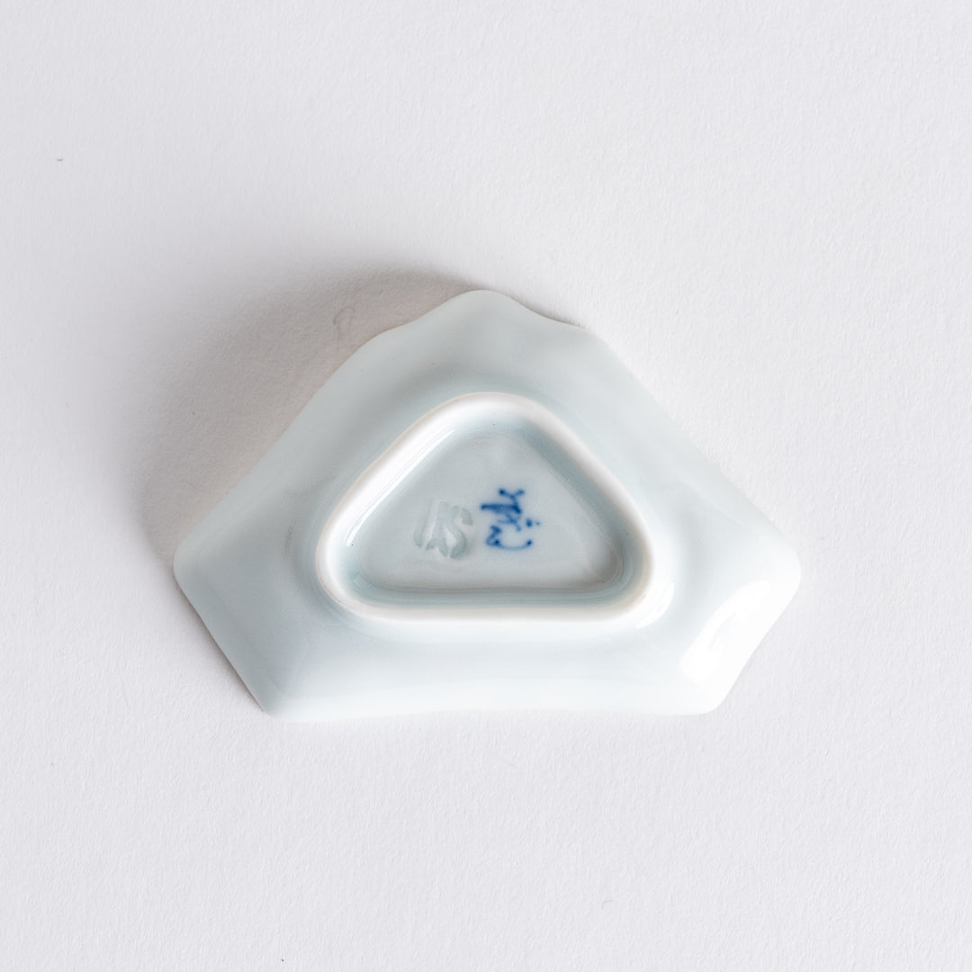 Bottom view of the Mount Fuji-shaped mini sauce dish, showing the unique shape and delicate blue ink design at the base.