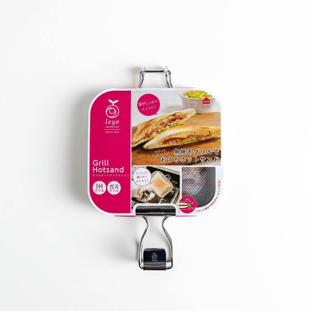 Packaged griller with product branding, showing a sandwich image and Japanese text on the label.