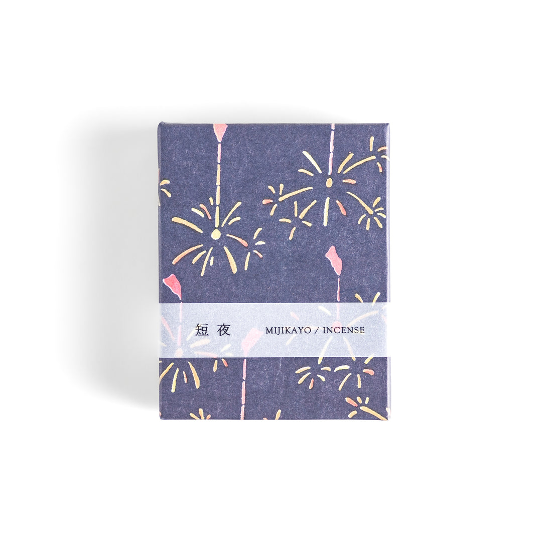 Incense featuring warm brown sticks in a box decorated with a dark blue background and delicate fireworks, evoking a nostalgic summer night atmosphere with a soothing aroma.