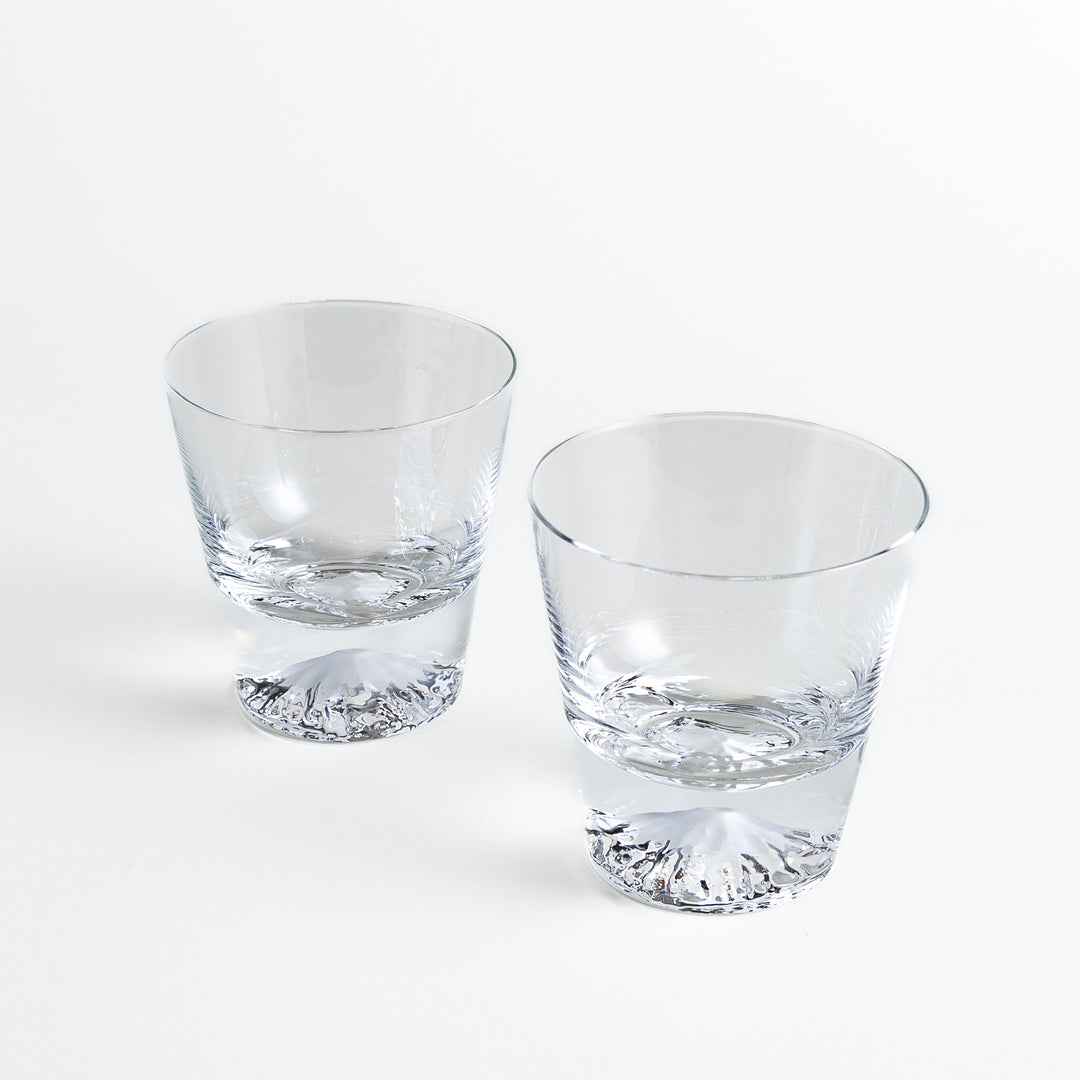 Two Mt. Fuji-themed clear rocks glasses side by side, capturing the elegant design and transparent beauty of the glass.