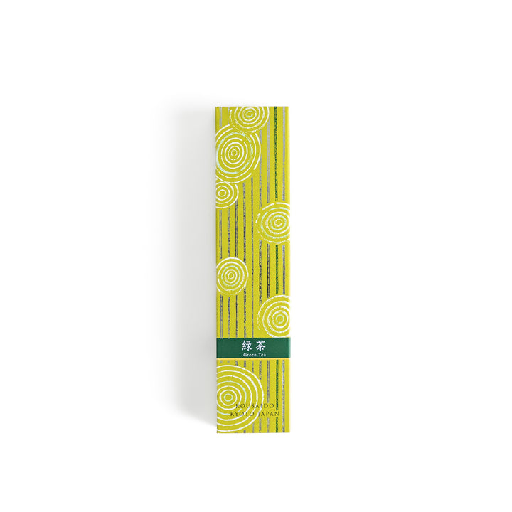 Tranquil Matcha Incense in a light wooden box with vibrant green sticks, elegantly packaged in a yellow design featuring white circular patterns, evoking the calming aroma of green tea.