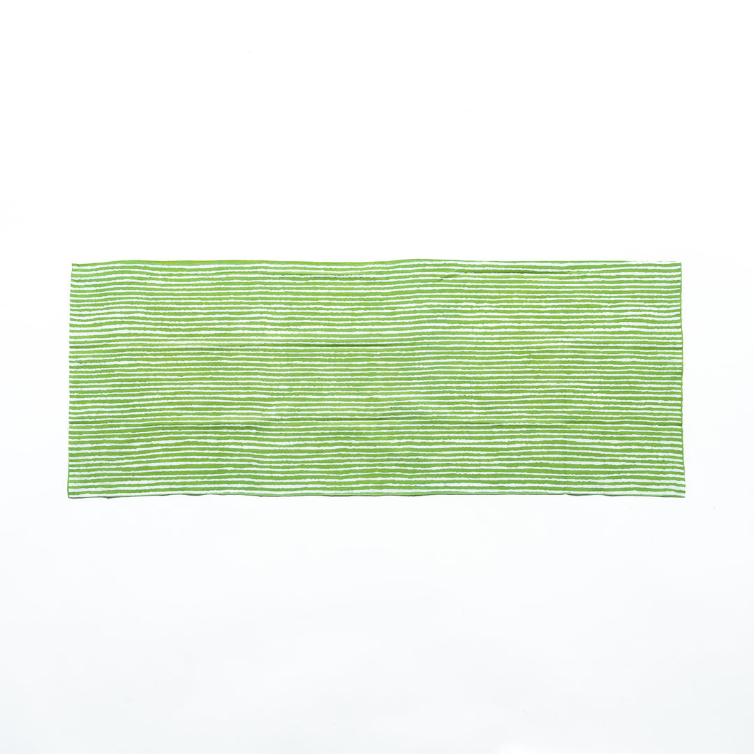 Green hand towel with vertical white stripes, laid flat for full view.