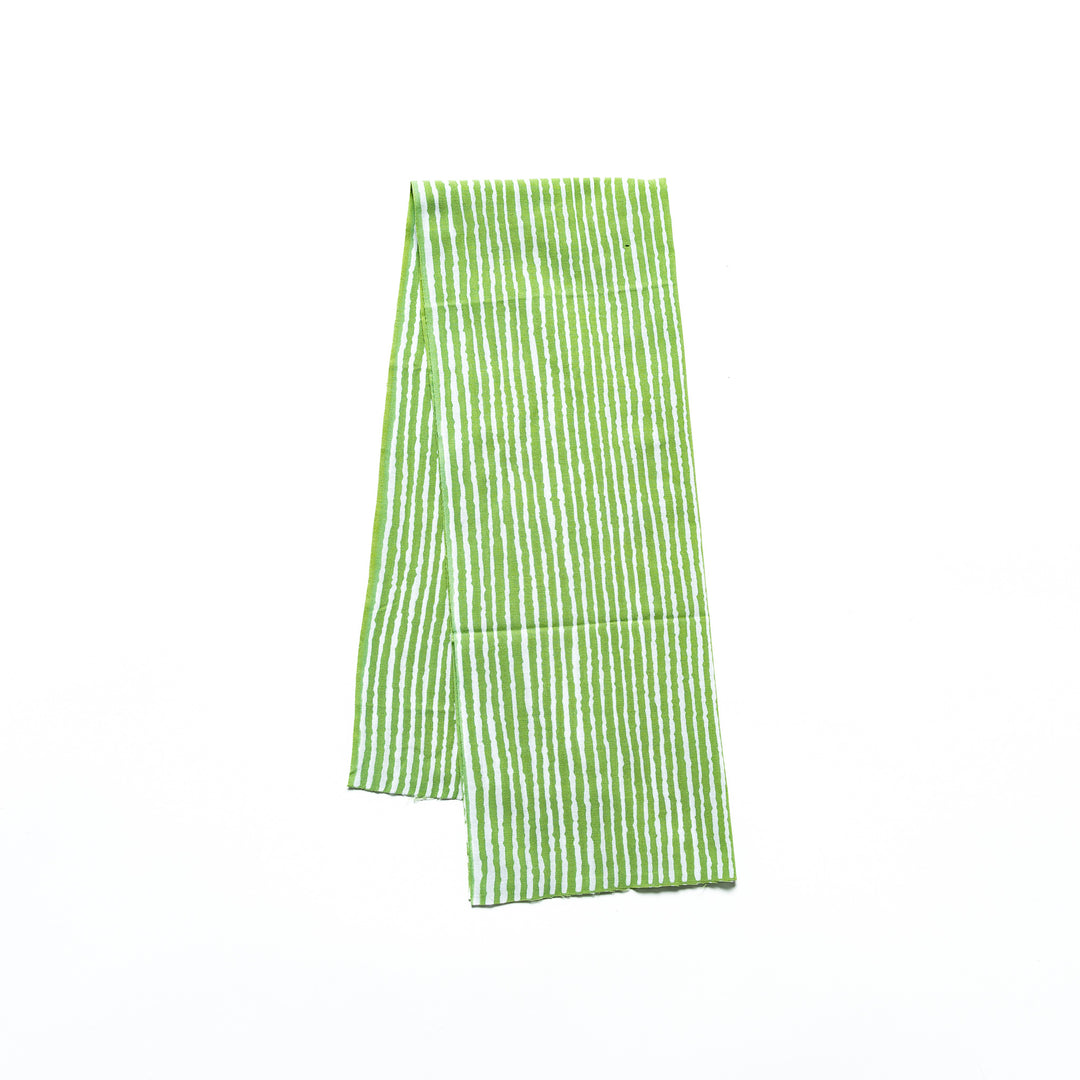 Green hand towel with vertical white stripes, folded neatly.