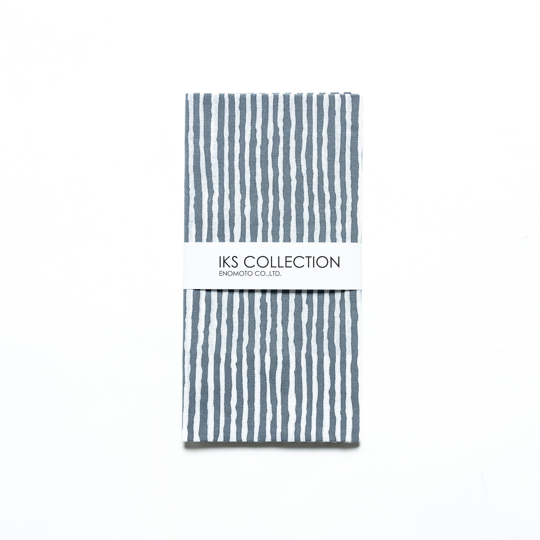 Gray hand towel with vertical white stripes, folded with a product sleeve.